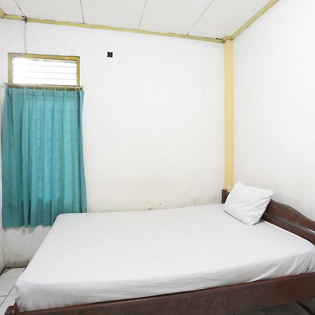 Oyo 93119 Guest House Leo Patra Muara Badak Buitenkant foto